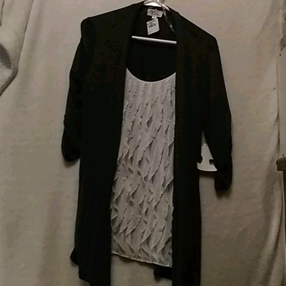 A shirt with a sewed in shirt